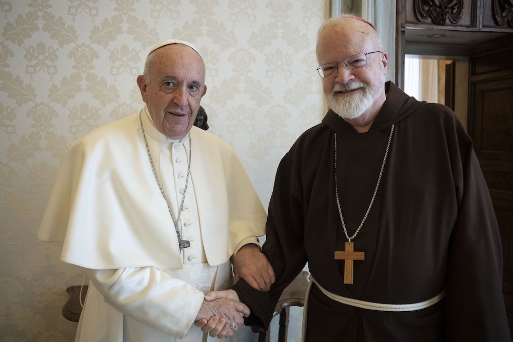 Pope Francis poses for a photo with Cardinal Sean P. O'Malley of Boston