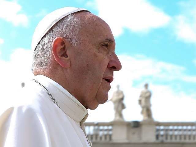 Pope Francis greets pilgrims in St. Peter's Square after the Wednesday general audience
