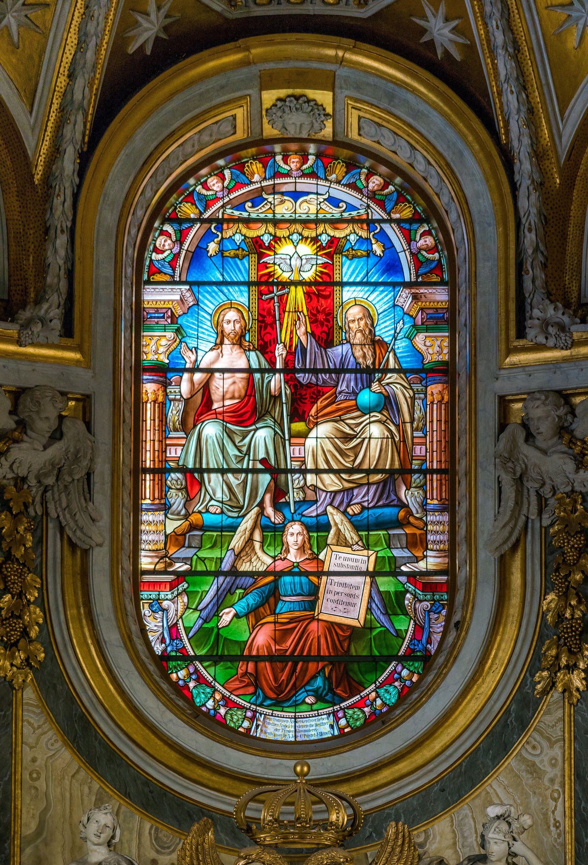 The Trinity in the stained glass of the Church of Santa Maria dell'Anima