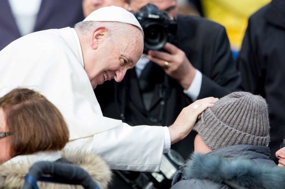 Pope Francis greets people with disabilities following the General Audience on Nov. 15