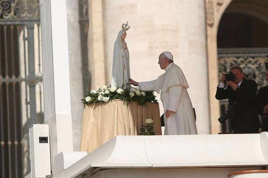 Pope Francis with a statue of Our Lady of Fatima at the General Audience in St. Peter's Square