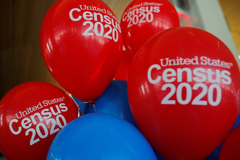 Balloons decorate an event for community activists and local government leaders to mark the one-year-out launch of the 2020 census efforts in Boston April 1