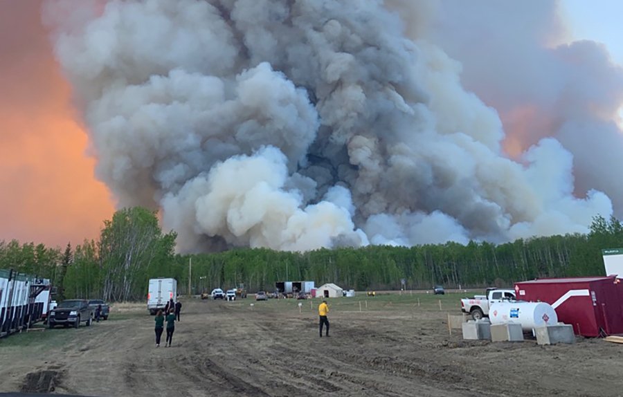 A forest fire is seen near High Level