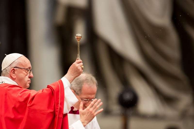 Pope Francis blesses the crowd with holy water on Pentecost Sunday May 20