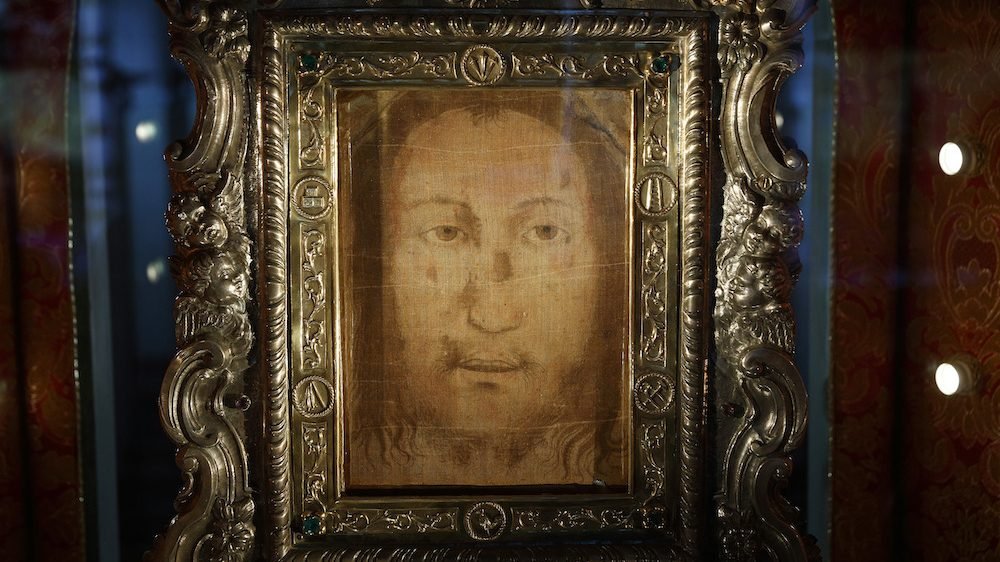 The Holy Face of Manoppello is pictured on display at the shrine in Manoppello, Italy, Jan. 11, 2019. Devotees believe that the almost transparent cloth was one of the burial shrouds that covered the face of Jesus in the tomb and that the image was formed miraculously at the moment of the resurrection. (CNS photo/Paul Haring)