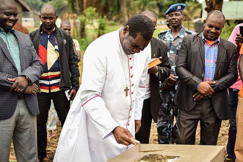 Bishop Edward Kussala of Tombura-Yambio lays the ceremonial cornerstone at the new facilities of St. Theresa Hospital in Nzara