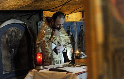 A Divine Liturgy of the Ukrainian Greek Catholic Church celebrated during protests in Kyiv's Maidan Square
