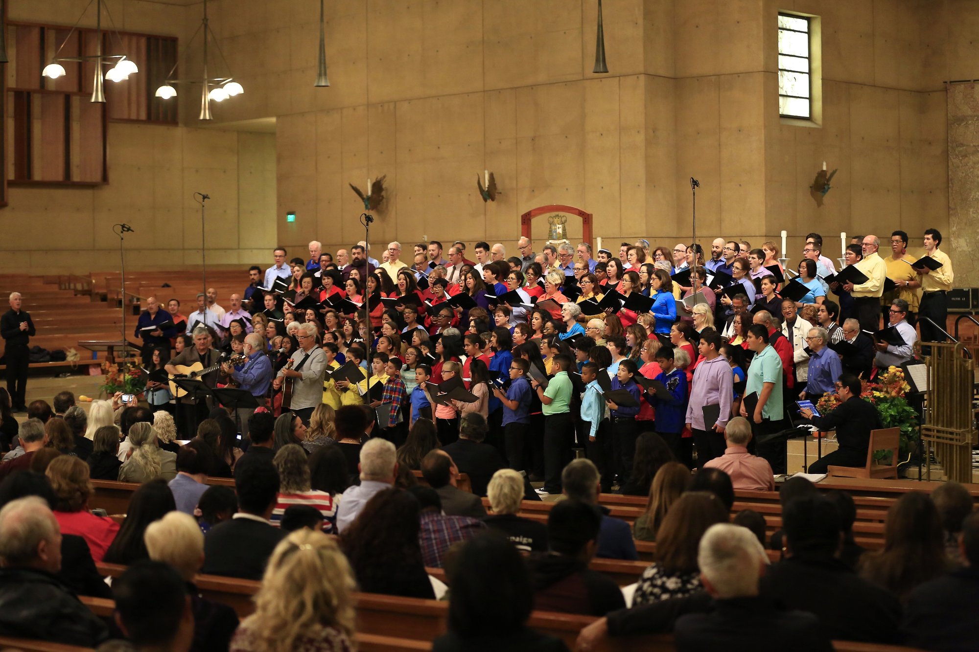 Jewish and Catholic choir members join together in song at the first interfaith concert at the Cathedral of Our Lady of the Angels