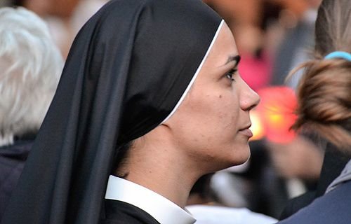 Religious sisters take part in a Eucharistic procession to the Basilica of St. Mary Major on June 19