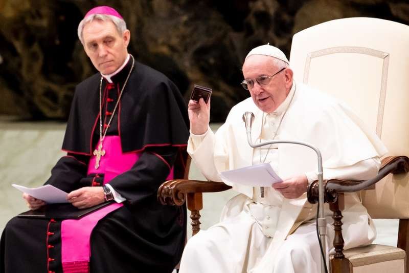Pope Francis shows the Way of the Cross meditations he keeps in his pocket