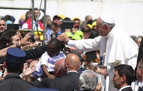 Pope Francis rides through St. Peter's Square after Mass on April 28