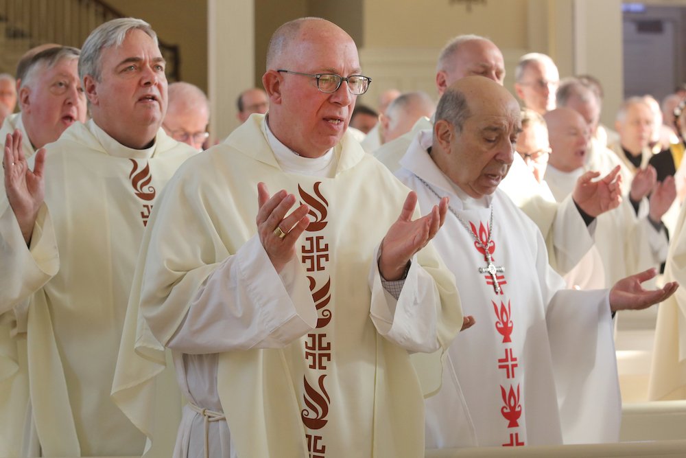 U.S. bishops pray during Mass in the Chapel of the Immaculate Conception at Mundelein Seminary Jan. 3 at the University of St. Mary of the Lake in Illinois
