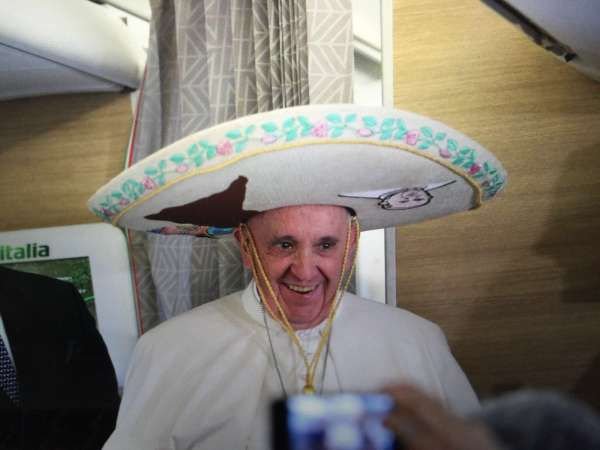 Pope Francis aboard the papal flight with journalists on his apostolic journey to Havana