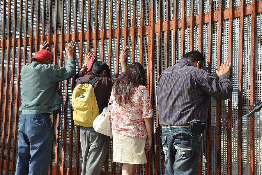 Gate from U.S. to Mexico. Credit: BBC World Service via Flickr (CC BY-NC 2.0).
