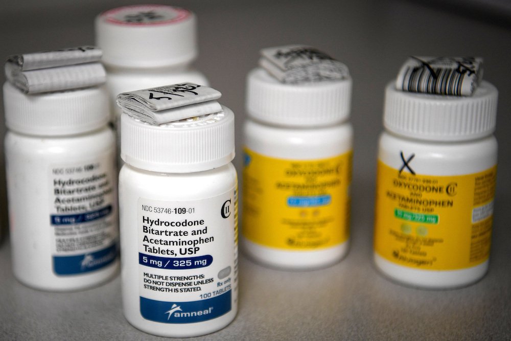 Bottles of opioid-based medication are seen at a pharmacy in Portsmouth