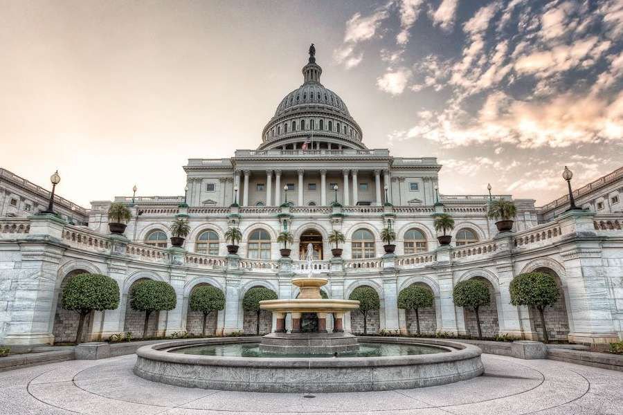 Dawn at the U.S. Capitol Building. Credit: IPBrian via Flickr (CC BY-NC-SA 2.0).