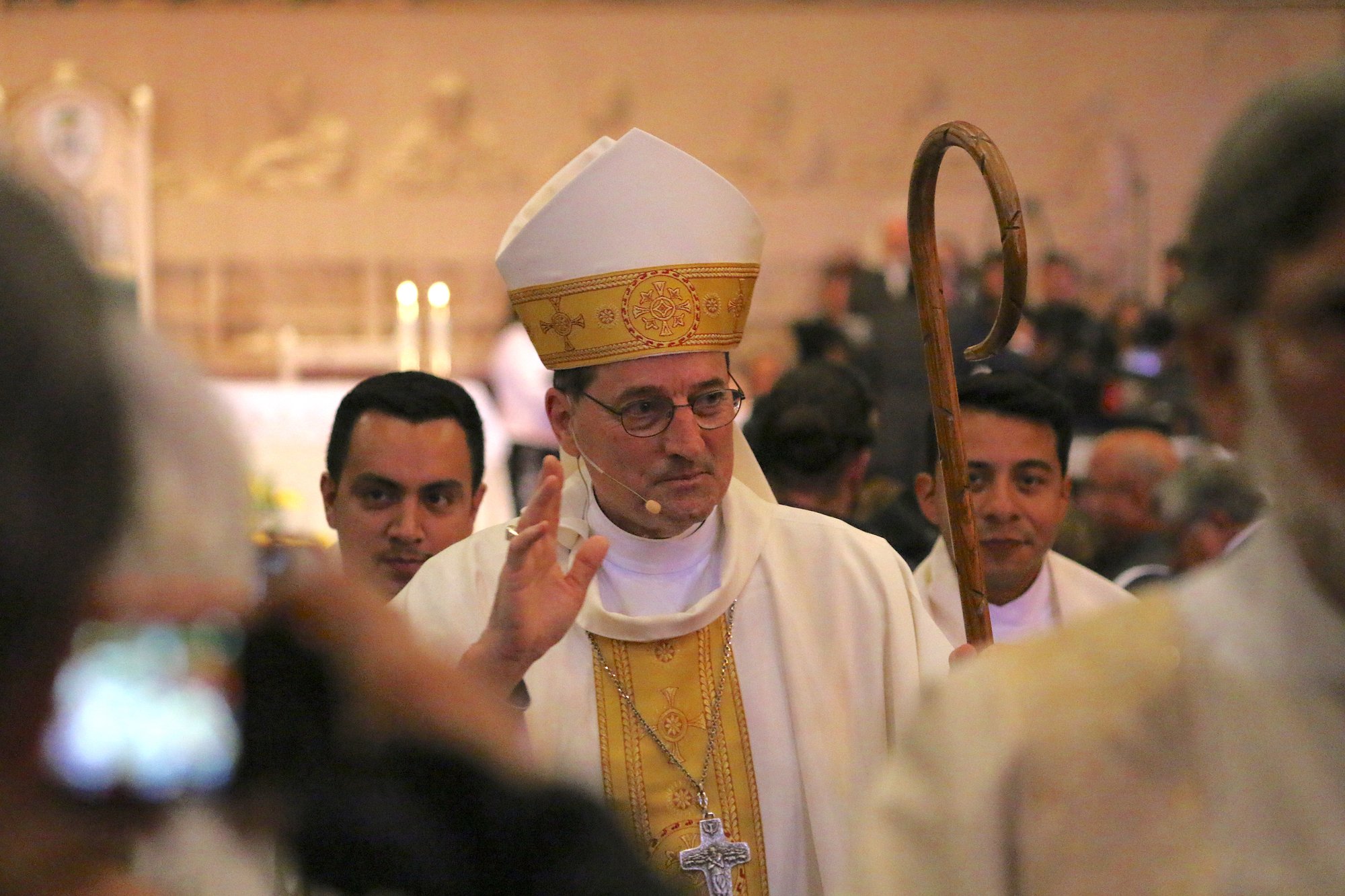 Bishop Joseph Brennan waves at his installation Mass in Fresno. (PHOTO COURTESY DIOCESE OF FRESNO)