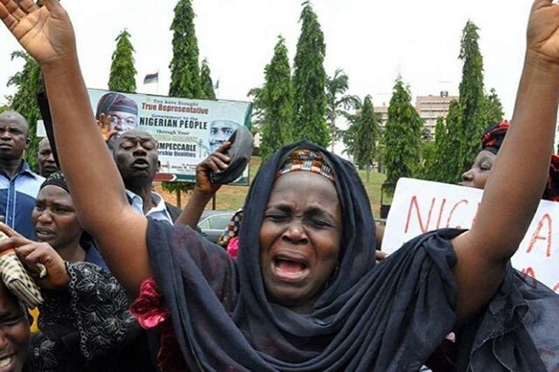 Family of kidnapped school girls in Nigeria. Credit: Pedro via Flickr (CC BY 2.0).