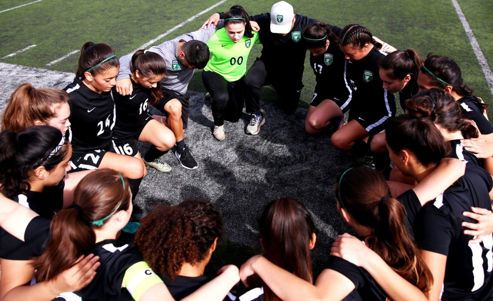 San Gabriel Mission High School girls' soccer team prays before a game. (Photo courtesy of SGMHS.org) 