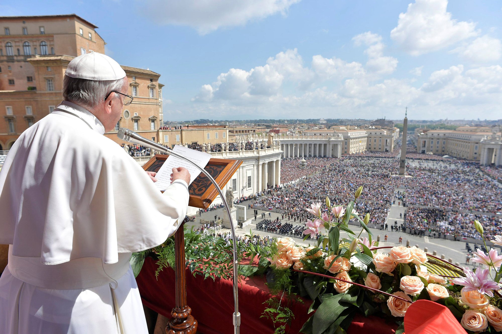 Pope Francis delivers his Easter message and blessing "urbi et orbi" (to the city and the world) from the central balcony of St. Peter's Basilica at the Vatican April 16. (CNS photo/L'Osservatore Romano)