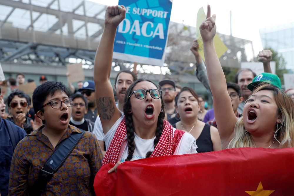 Demonstrators chant during a 2017 rally against the ending of the Deferred Action for Childhood Arrivals