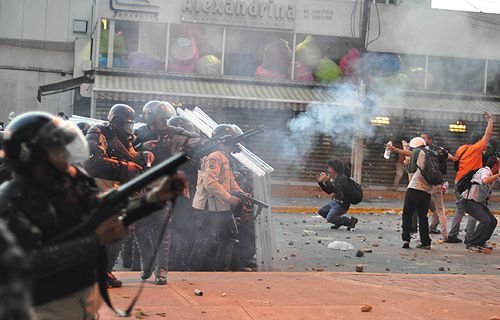 Venezuelan protestors met by riot police in Caracas
