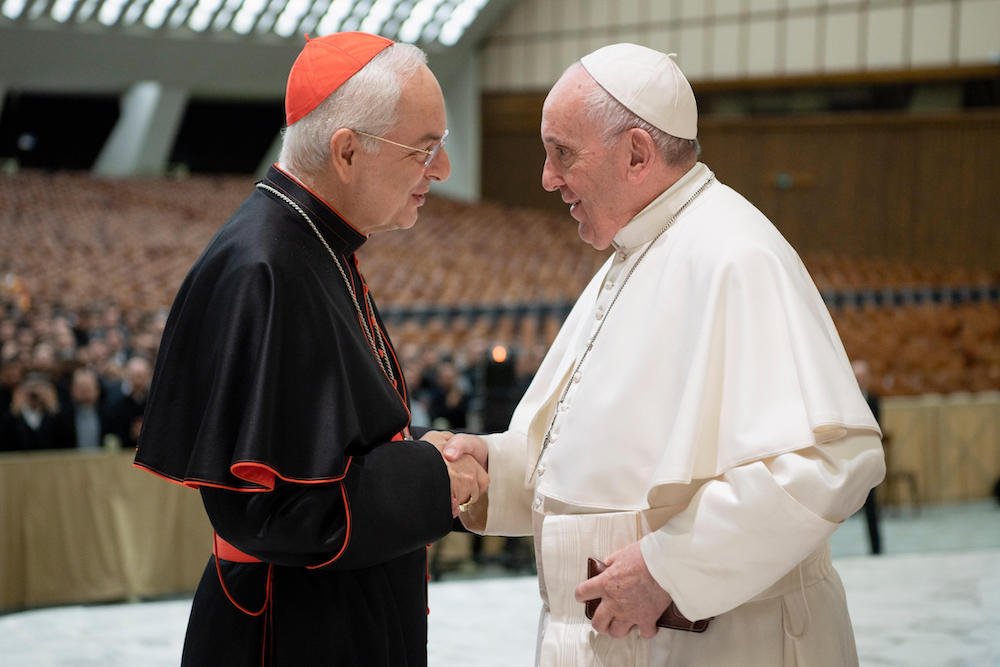 Pope Francis greets Cardinal Mauro Piacenza