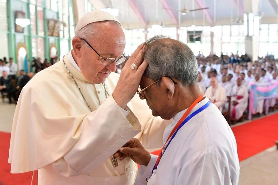 Pope Francis listens to testimonies during a meeting with priests