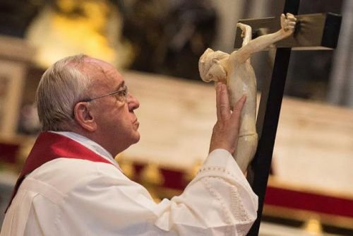 Pope Francis venerates the cross on Good Friday 2015. Credit: L'Osservatore Romano.