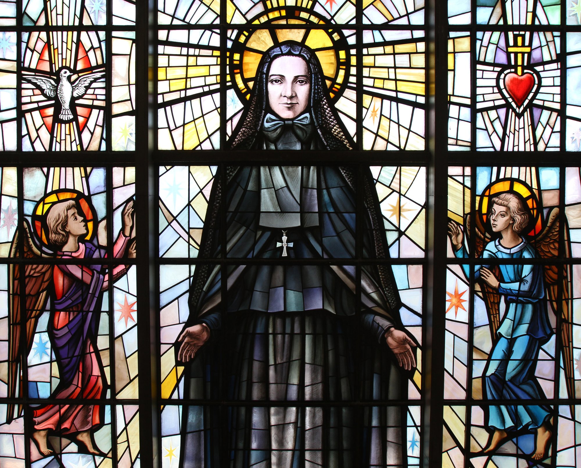 St. Frances Xavier Cabrini is depicted in a stained-glass window at the saint's shrine chapel in the Washington Heights section of New York City. (CNS PHOTO/GREGORY A. SHEMITZ)