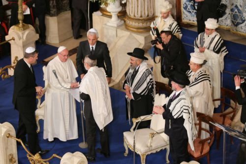 Pope Francis is greeted at Rome's Major Synagogue