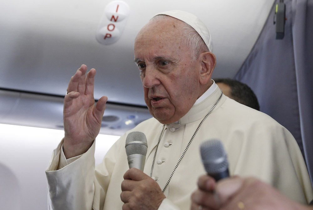 Pope Francis answers questions from journalists aboard his flight from Sibiu