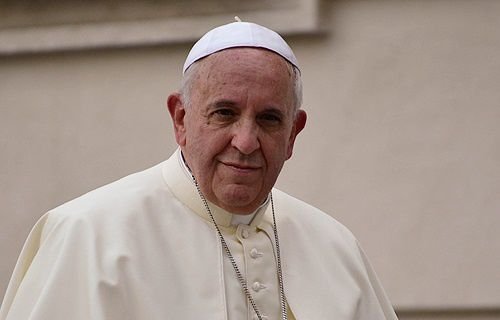 Pope Francis greets pilgrims in St. Peter's Square during the Wednesday general audience on May 28
