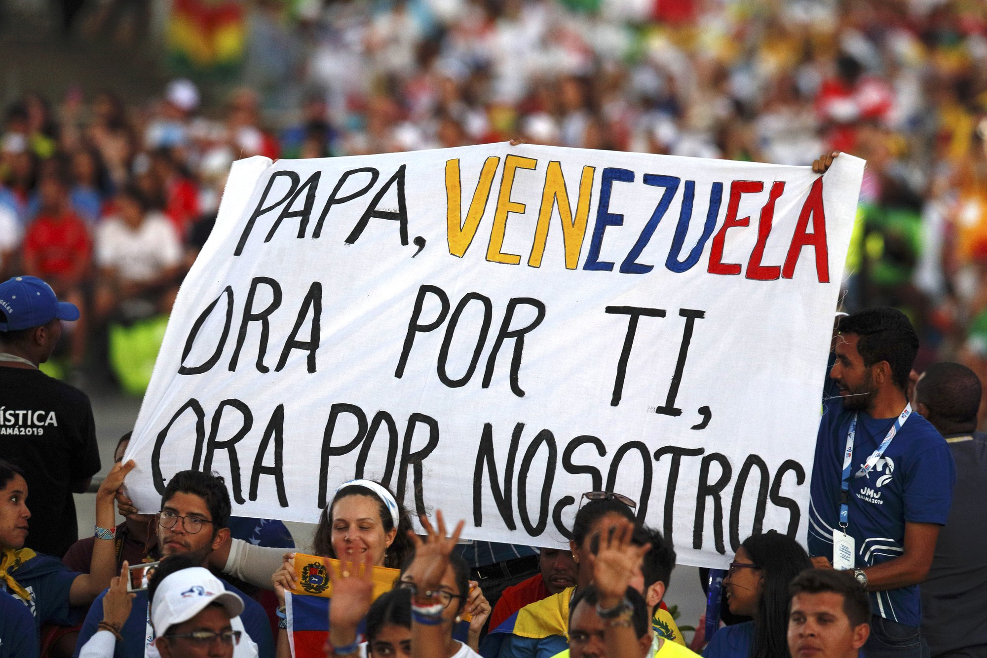 A sign calls attention to Venezuela as Pope Francis leads the World Youth Day prayer vigil at St. John Paul II Field in Panama City Jan. 26. (CATHOLIC NEWS SERVICE/PAUL HARING)