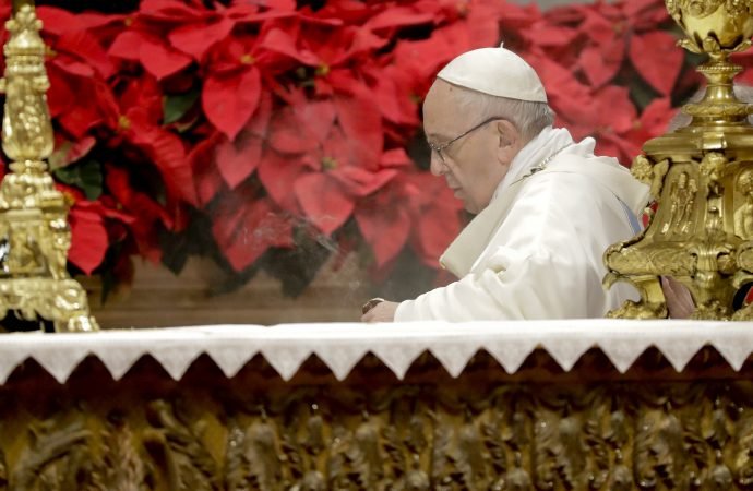 Pope Francis incenses the altar as he celebrates a new year Mass in St. Peter's Basilica at the Vatican