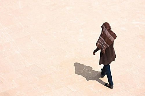 A woman walks on the roof of Ibn Tulum Mosque. Credit: Hector de Pereda via Flickr (CC BY-NC 2.0).