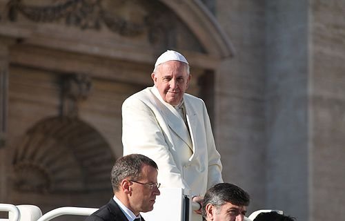 Pope Francis greets pilgrims in St. Peter's Square during the Wednesday general audience on Dec. 4