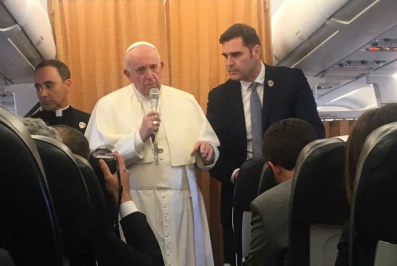 Pope Francis aboard the papal plane en route from Skopje to Rome
