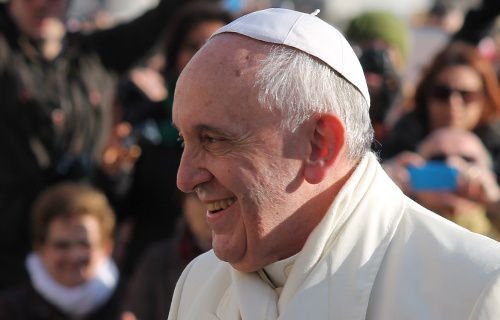 Pope Francis greets pilgrims during the Wednesday general audience on Jan. 8