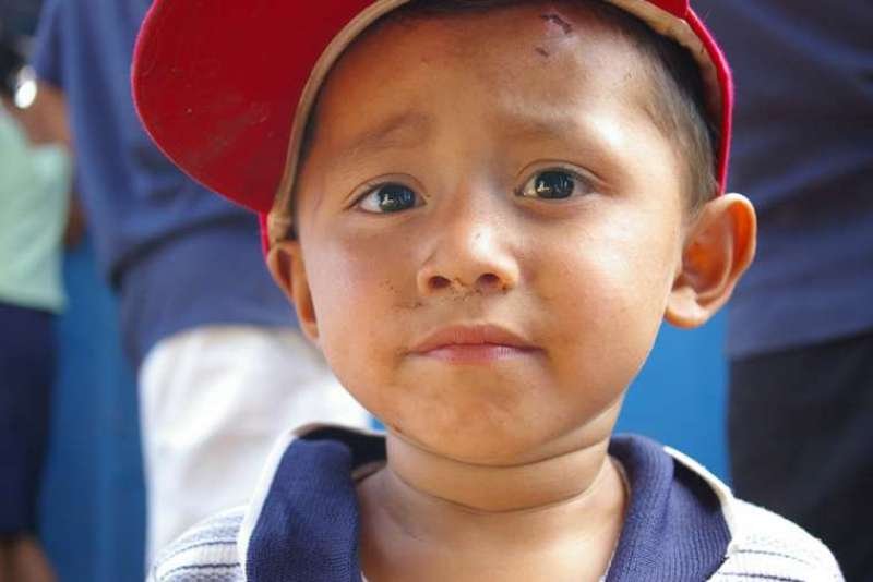 El Salvadoran boy. Credit: Ian MacLellan/Shutterstock