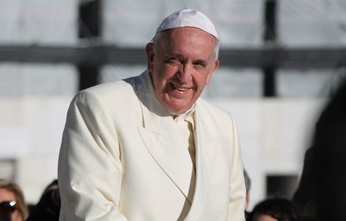 Pope Francis greets pilgrims in St. Peter's Square during the Wednesday general audience on Dec. 4