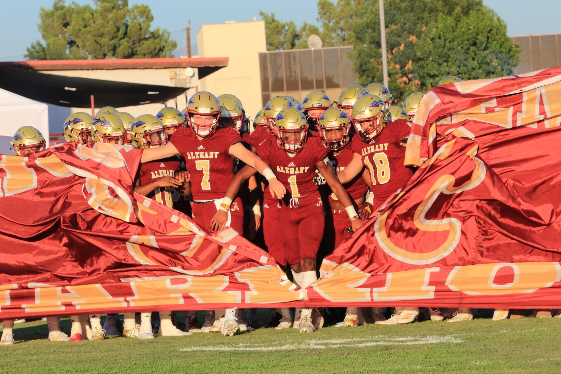 The Alemany Warriors football team takes the field before their game on Aug. 16. (Alemany Football/Twitter)
