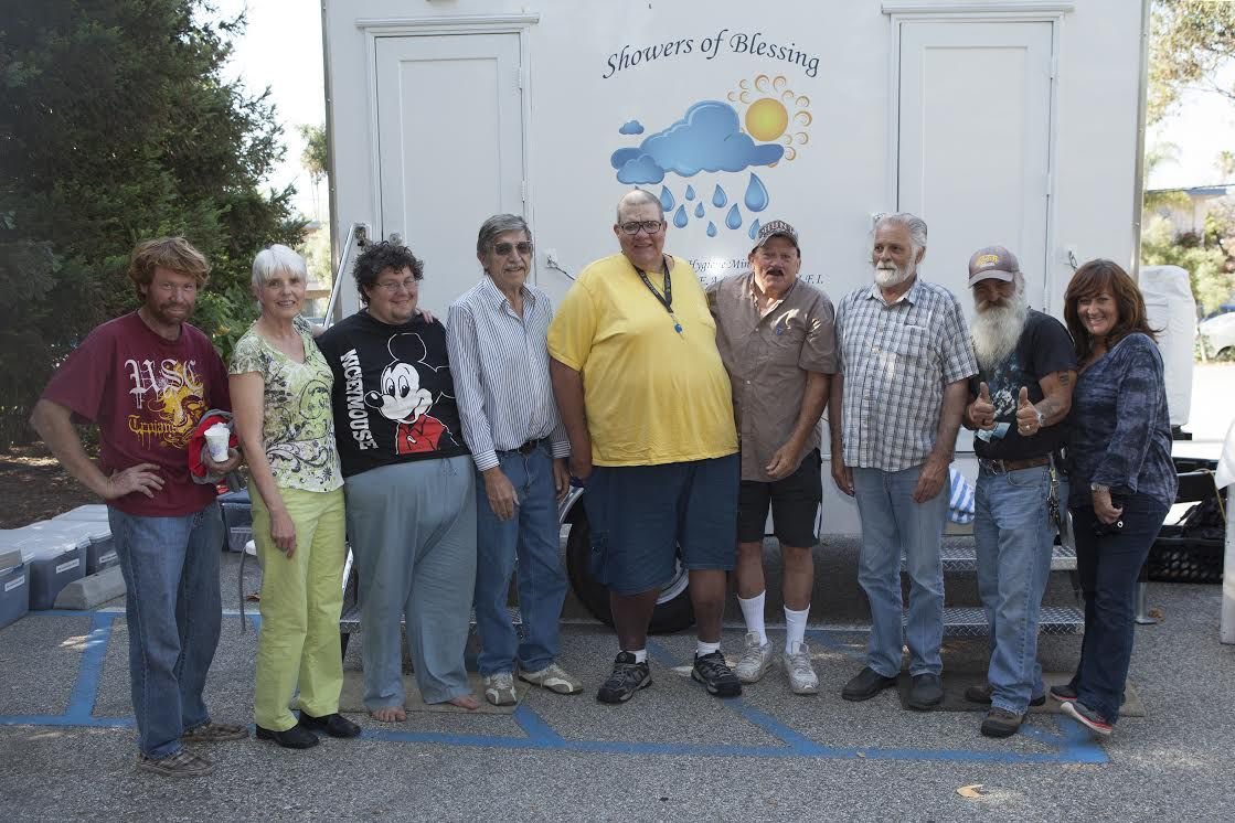 Adult operators of the Showers of Blessings mobile unit that serves the homeless in Santa Barbara