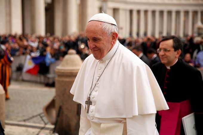 Pope Francis arrives to his March 22