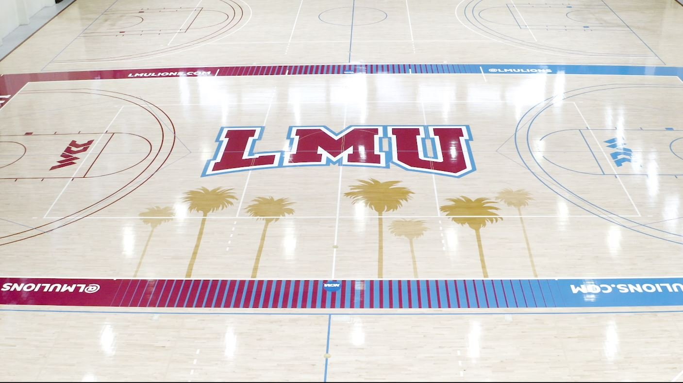 The basketball and volleyball court at LMU’s Gersten Pavilion has been updated with new paint and new overhead lighting. (LMU ATHLETICS)