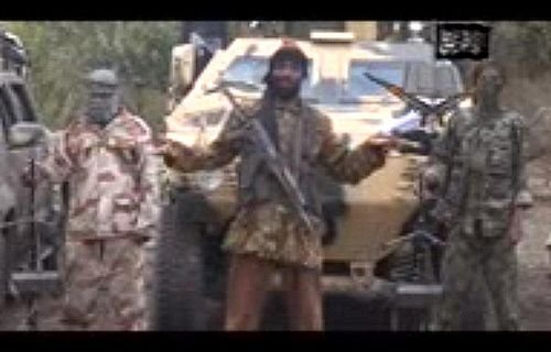 Abubakar Shekau in a low quality video admitted to kidnapping nearly 300 girls in Nigeria and threatened to sell them (Screengrab).