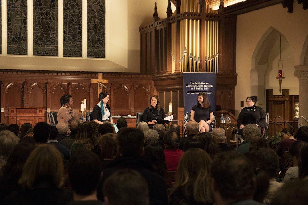 Panelists talk about "Resisting the Throwaway Culture" at Georgetown University in Washington Jan. 15. Pictured are Gloria Purvis