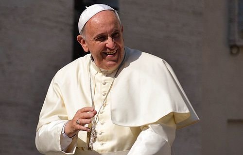 Pope Francis greets pilgrims in St. Peter's Square during the Wednesday general audience on June 4