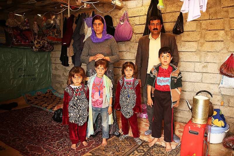 A family at the Sharia Al Haman Hope refugee camp in Duhok