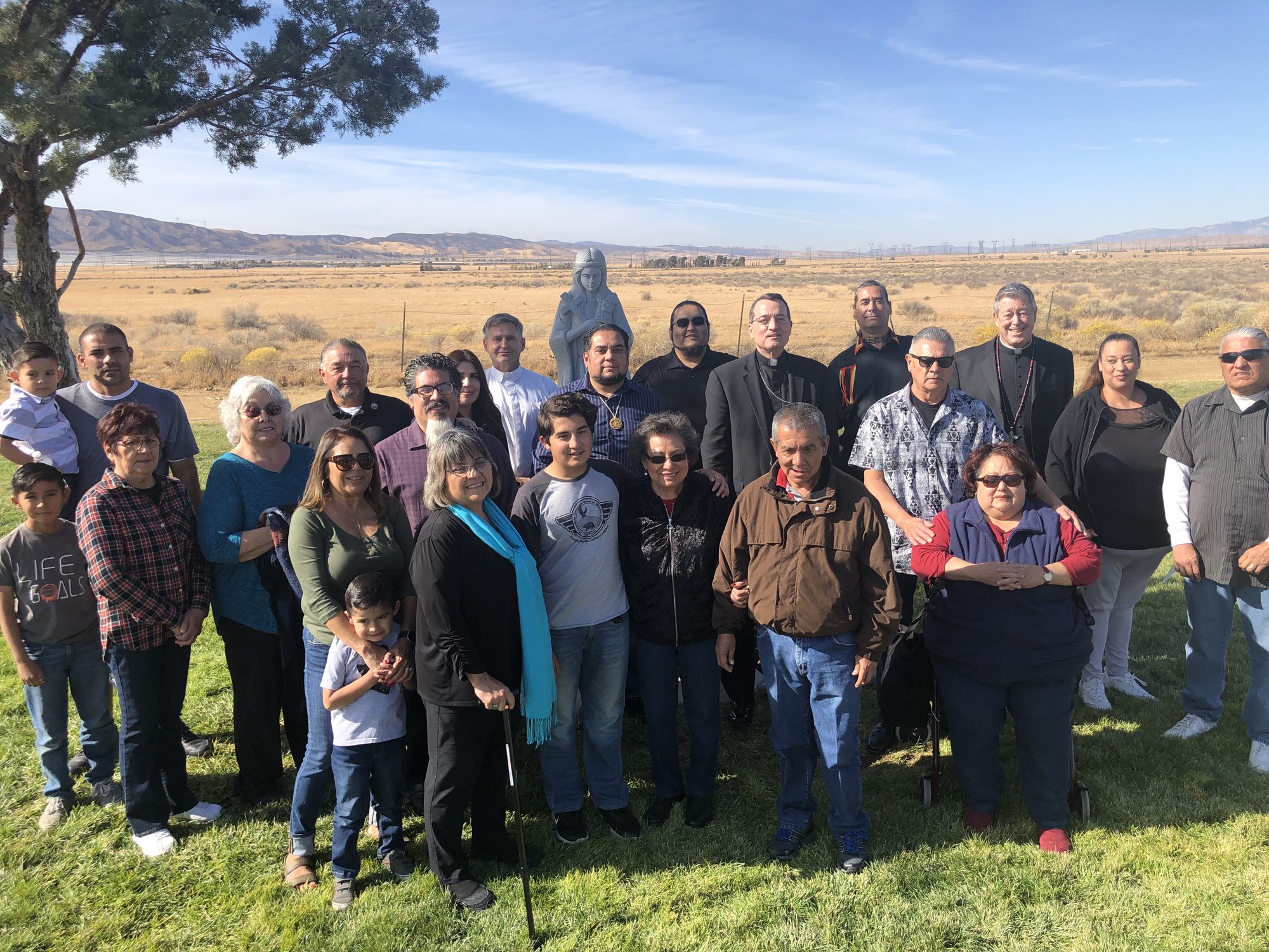 Members of the Fernandeño Tataviam Band of Mission Indians were joined by Los Angeles Auxiliary Bishops Joseph Brennan and Edward Clark at the dedication and blessing of a new reburial site at Good Shepherd Cemetery in Lancaster November 17. (DELFIN MAGPANTAY)